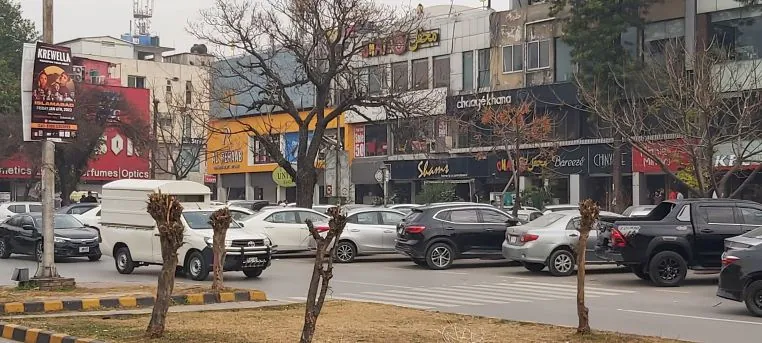 Shops and traffic on the F-6 Super Market street in Islamabad